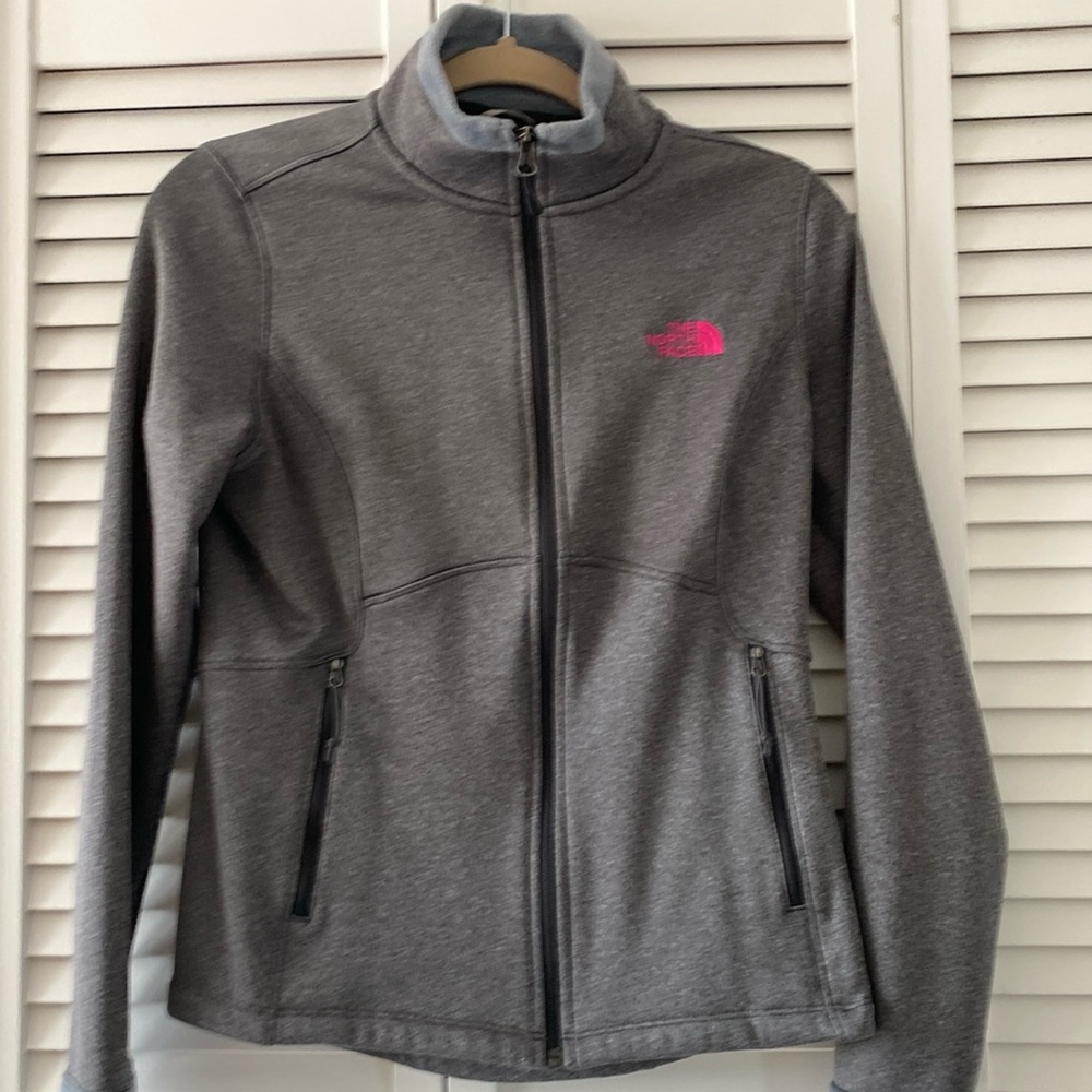 Gray light/medium weight fleece lined North Face jacket.